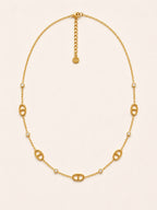 Aubine — collier maillons marine et zircons, packshot