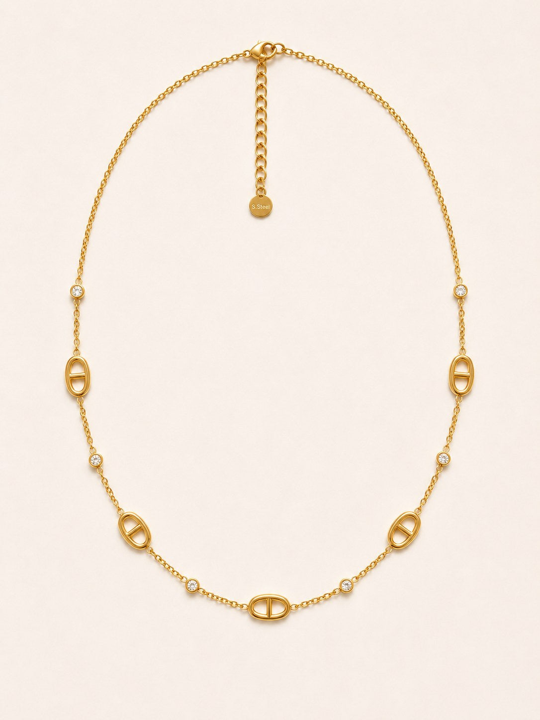 Aubine — collier maillons marine et zircons, packshot
