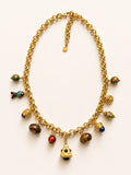 Ava — collier doré à breloques, pierres naturelles