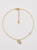Aida, collier fine chaîne dorée à pendentifs zircons, packshot sur fond clair